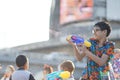 Kid plays water during Songkran